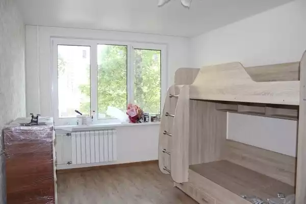фото капитального ремонта квартиры на ул. Кустодиева д.12 установка мебели в детской